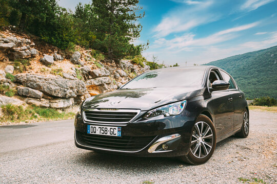 Black colour Peugeot 308 car on background of French mountain nature landscape the Gorges Du Verdon in France