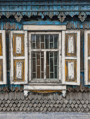 Carved platbands of old wooden windows