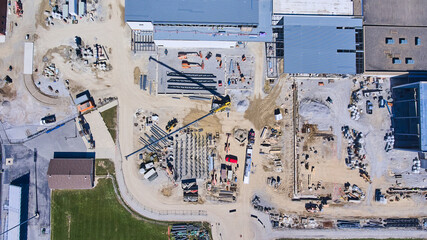 Wide aerial view looking straight down on construction site