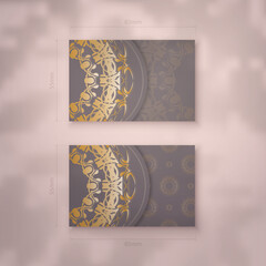 Brown business card with luxurious gold pattern for your personality.