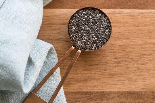 Black Chia Seeds in a Measuring Spoon