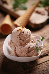 Scoops of Chocolate and Vanilla Ice Cream on Plate