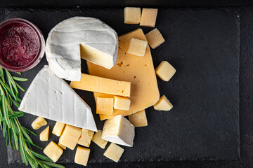 cheese plate assorted cheeses aperitif antipasto brie, camembert, cheddar, parmesan and others...