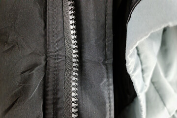 The Jacket zipper. Jacket fastening. Qualitative clothes.