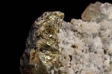 Macro of a mineral stone Sphalerite with fluorite and pyrite on a black background close up