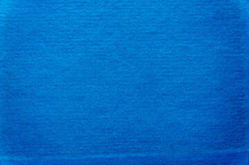 Fototapeta na wymiar Old blue painted cardboard texture background