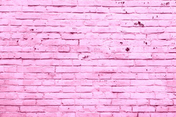 Texture of a brick wall with cracks and scratches which can be used as a background