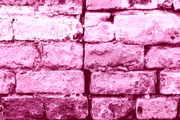 Texture of a brick wall with cracks and scratches which can be used as a background