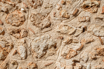 Old masonry wall, stone yellow, background image.