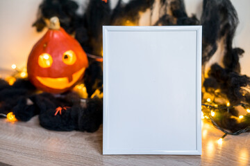 Halloween concept. Photo frame decorations in interior copy space