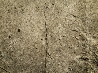A very old concrete wall is a decorative or textured surface. Can be used as a background or for design purposes