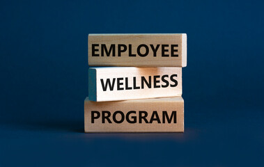Employee wellness program symbol. Concept words 'Employee wellness program' on wooden blocks. Beautiful grey background. Copy space. Business and employee wellness program concept.