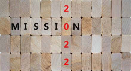 2022 mission new year symbol. Wooden blocks with words 'Mission 2022'. Beautiful wooden background, copy space. Business, 2022 mission new year concept.