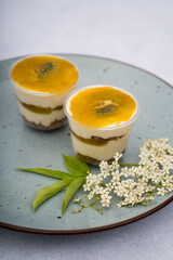 Lulo desserts with leaves on a marble background