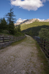 Fototapeta na wymiar mountain roads between Ceresole Reale and the Nivolet hill around serrù lake, Agnel lake, Nivolet lake in Piedmont in Italy