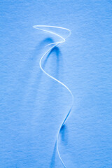 Paper fragments on the textured paper