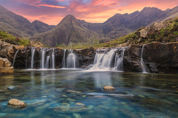 Amazing sunset at the Fairy Pools, Glen Brittle, Isle of Skye, Scotland - obrazy, fototapety, plakaty