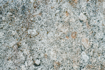 Unusual texture of natural stone with cracks and textures. Natural granite is a mineral stone. Concept - texture for background