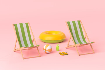 Beach chair with inflatable ring and beach ball on pink background.