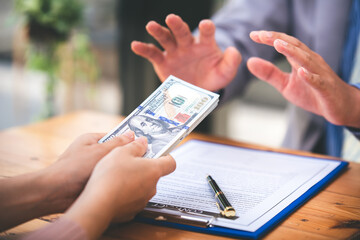 Corruption and Bribery Businessman manager refuses to take money from businessman sends dollar to get contract