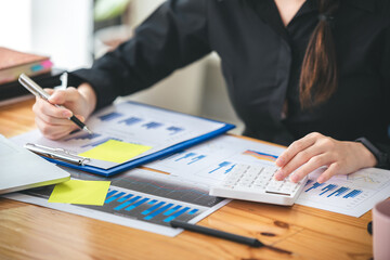 business woman work in the business office on the desk