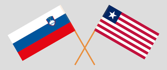 Crossed flags of Slovenia and Liberia. Official colors. Correct proportion
