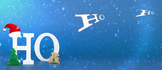 Christmas background with the inscription HoHoHo