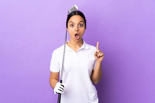 Young golfer woman over isolated colorful background thinking an idea pointing the finger up