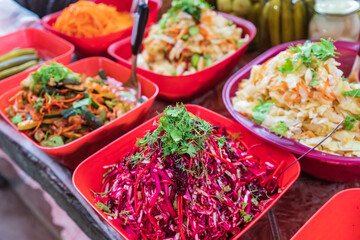 Vegetable salads for sale at the Panjshanbe Bazaar in Khujand.