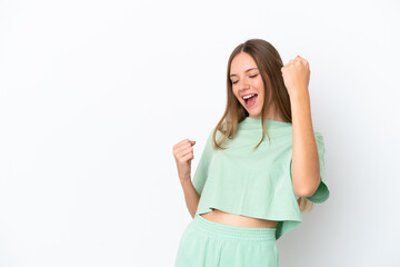 Young Lithuanian woman isolated on white background celebrating a victory