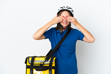 Lithuanian woman with thermal backpack covering eyes by hands