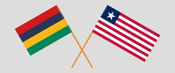 Crossed flags of Mauritius and Liberia. Official colors. Correct proportion