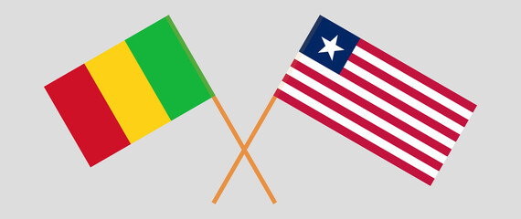 Crossed flags of Mali and Liberia. Official colors. Correct proportion