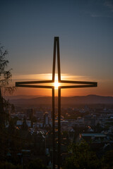 Christian Cross and Sunset Freiburg