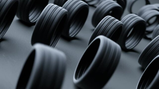 Endless animation with rolling car wheels. Black rubber tires moving around.