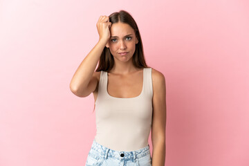 Obraz premium Young woman over isolated pink background with an expression of frustration and not understanding