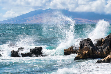 powerful surf splashing the rocks