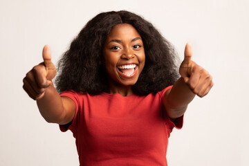 Great Choice. Portraif Of Cheerful Black Woman Showing Thumbs Up At Camera