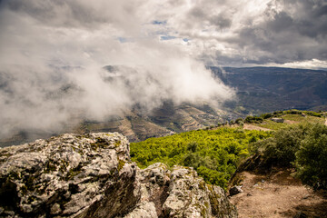 Mountain scenery with cloudy sky