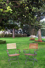 Empty chairs in the garden.