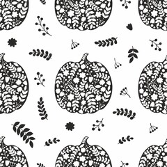Halloween pumpkin. Vector seamless pattern with silhouettes of pumpkins. Black and white
