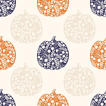 Halloween pumpkin. Vector seamless pattern with silhouettes of pumpkins.
