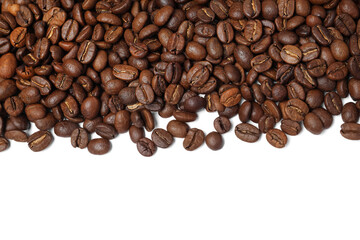 Many roasted coffee beans on white background, top view
