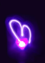 abstract background. blurred neon heart in dark space