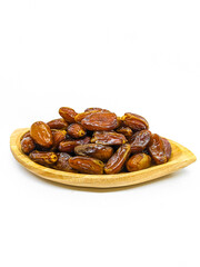 Fresh and healty premium honey tunisia dates (kurma tunisia) in a wooden bowl isolated on white background
