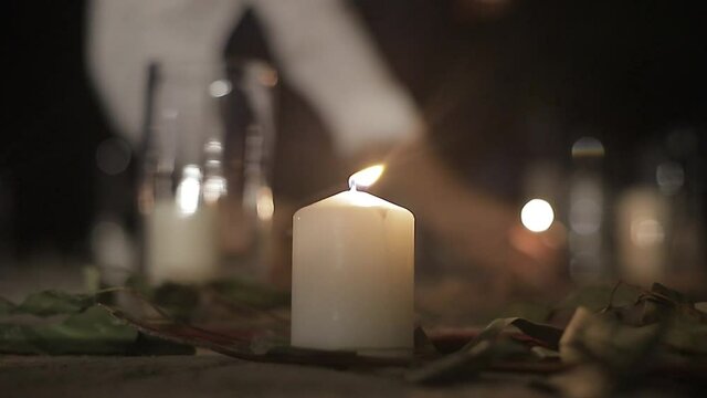 Candles burning at night on dark background. candles concept for scrying and tarot reading