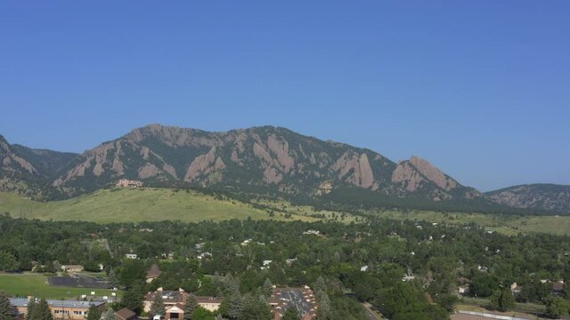 aerial drone shot of boulder colorado peaks during a sunny day in summer