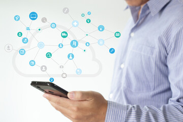 Man holding smart phone with virtual cloud computing on hand with connection line.Cloud computing is system for sharing download and upload big data information.