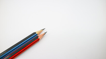  Red and blue pencils isolated on white background
