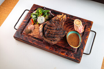 Fototapeta na wymiar steak on the background of a bula